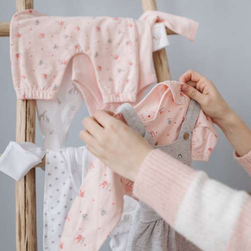 A woman doing baby laundry